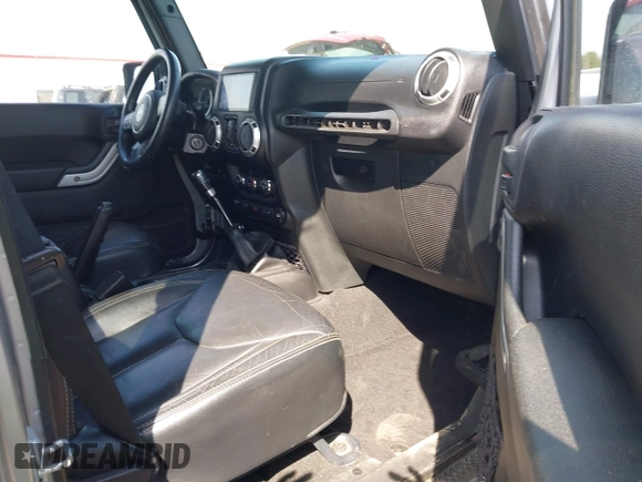 2015 Jeep Wrangler Unlimited Sahara with VIN 1C4BJWEG2FL558860, listed as a IAAI auction lot 41937360 with 113,627 mi miles. Bid and sale history available at carsss.com. Image 5.