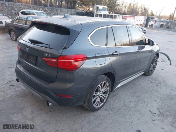 2017 BMW X1 xDrive28i with VIN WBXHT3C33H5F87591, listed as a IAAI auction lot 41256899 with 69,362 mi miles. Bid and sale history available at carsss.com. Image 4.