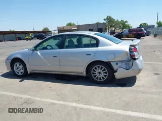 2006 Nissan Altima 2.5 with VIN 1N4AL11D96N412812, listed as a IAAI auction lot 42398083 with 214,369 mi miles and . Bid and sale history available at DreamBid. Image 13.