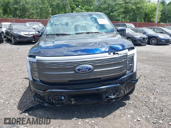 2023 Ford F-150 Lightning Pro с VIN 1FT6W1EVXPWG42428, выставлен на аукционе IAAI как лот 39711091 с пробегом 6 308 миль миль и . История ставок и продаж доступна на DreamBid. Изображение 12.