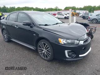 2017 Mitsubishi Lancer ES z VIN JA32V2FW6HU001870, wystawiony jako IAAI lot #42333550 z przebiegiem 75 938 mil mil oraz . Historia ofert i sprzedaży dostępna na DreamBid. Obrazek 1.