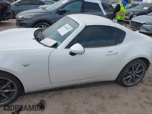 2021 Mazda MX-5 Miata Grand Touring with VIN JM1NDAM71M0454514, listed as a IAAI auction lot 41940252 with Not provided miles and . Bid and sale history available at DreamBid. Image 14.