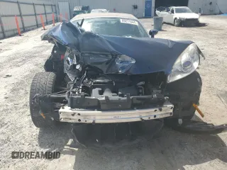 2007 Saturn Sky z VIN 1G8MB35B67Y103887, wystawiony jako Copart lot #69271544 z przebiegiem 62 365 mil mil oraz Szkody całkowita. Historia ofert i sprzedaży dostępna na DreamBid. Obrazek 5.