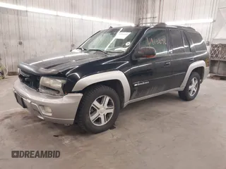 2004 Chevrolet TrailBlazer LS with VIN 1GNDT13S942308362, listed as a IAAI auction lot 41913292 with 153,458 mi miles. Bid and sale history available at carsss.com. Image 2.