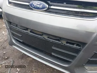 2014 Ford Escape Titanium with VIN 1FMCU0JX2EUA28679, listed as a IAAI auction lot 41930585 with 164,038 mi miles. Bid and sale history available at carsss.com. Image 6.