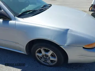 2004 Oldsmobile Alero GL1 z VIN 1G3NL52E04C197517, wystawiony jako IAAI lot #42315934 z przebiegiem Nie podano mil oraz . Historia ofert i sprzedaży dostępna na DreamBid. Obrazek 14.