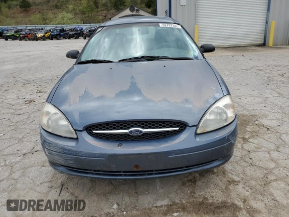 2000 Ford Taurus SE z VIN 1FAFP53U5YA259273, wystawiony jako Copart lot #52787305 z przebiegiem 234 848 mil mil oraz Szkoda całkowita • Salvage title. Historia ofert i sprzedaży dostępna na DreamBid. Obrazek 5.