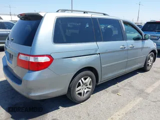 2007 Honda Odyssey EX-L with VIN 5FNRL38777B016421, listed as a IAAI auction lot 42139239 with 286,558 mi miles. Bid and sale history available at carsss.com. Image 4.