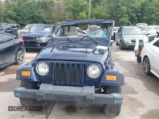 2006 Jeep Wrangler SE with VIN 1J4FA29156P739521, listed as a IAAI auction lot 42563566 with 117,281 mi miles and . Bid and sale history available at DreamBid. Image 12.