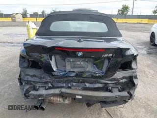 2013 BMW 1 Series 128i with VIN WBAUN1C54DVR01541, listed as a IAAI auction lot 42802640 with 119,881 mi miles and . Bid and sale history available at DreamBid. Image 6.