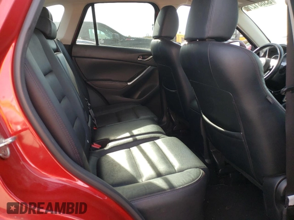 2016 Mazda CX-5 Grand Touring with VIN JM3KE4DYXG0850270, listed as a Copart auction lot 83681274 with 121,486 mi miles and Salvage Title. Bid and sale history available at carsss.com. Image 11.