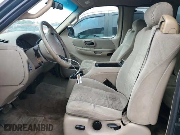 2001 Ford F-150 XL with VIN 1FTRX17L51NA83857, listed as a Copart auction lot 62759145 with 215,961 mi miles and Salvage title. Bid and sale history available at DreamBid. Image 7.