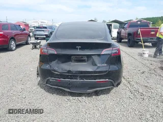 2022 Tesla Model Y Performance z VIN 7SAYGDEF5NF546680, wystawiony jako IAAI lot #42229359 z przebiegiem 55 597 mil mil oraz . Historia ofert i sprzedaży dostępna na DreamBid. Obrazek 16.