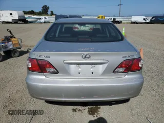 2002 Lexus ES 300 with VIN JTHBF30G920050886, listed as a Copart auction lot 57087355 with 131,304 mi miles and Salvage title. Bid and sale history available at DreamBid. Image 6.