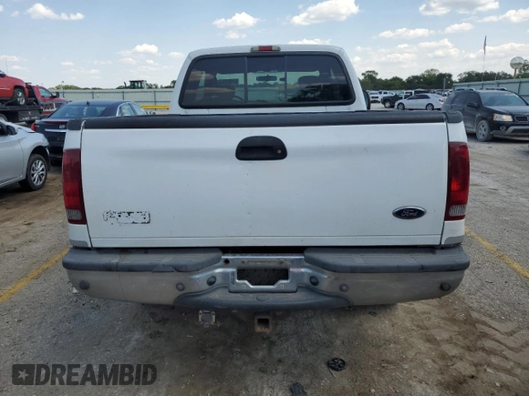 2004 Ford Super Duty F-250 XL with VIN 1FTNX21P14EC94526, listed as a Copart auction lot 71207774 with 176,238 mi miles and Salvage Title. Bid and sale history available at carsss.com. Image 6.