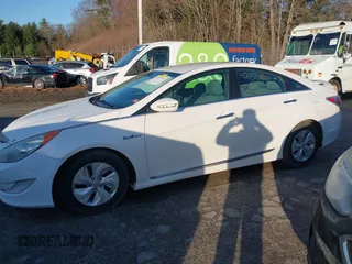 2013 Hyundai Sonata Hybrid with VIN KMHEC4A45DA065198, listed as a IAAI auction lot 42137511 with 219,500 mi miles. Bid and sale history available at carsss.com. Image 12.