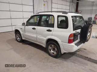 2000 Suzuki Grand Vitara JLX z VIN JS3TD62V1Y4119064, wystawiony jako IAAI lot #40845963 z przebiegiem 339 219 mil mil oraz . Historia ofert i sprzedaży dostępna na DreamBid. Obrazek 3.