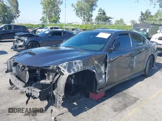 2019 Dodge Charger R/T z VIN 2C3CDXCT7KH527732, wystawiony jako IAAI lot #42283453 z przebiegiem 99 755 mil mil oraz . Historia ofert i sprzedaży dostępna na DreamBid. Obrazek 19.