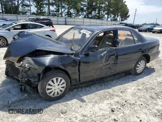 1994 Toyota Camry LE z VIN 4T1SK12E6RU408523, wystawiony jako Copart lot #56314665 z przebiegiem 221 867 mil mil oraz Szkoda całkowita • Salvage title. Historia ofert i sprzedaży dostępna na DreamBid. Obrazek 1.