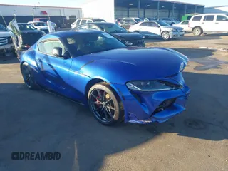 2023 Toyota GR Supra 3.0 with VIN WZ1DB0G01PW057818, listed as a IAAI auction lot 41405386 with 18 mi miles. Bid and sale history available at carsss.com. Image 1.