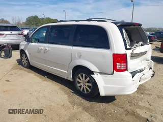 2009 Chrysler Town & Country Touring with VIN 2A8HR54X89R642118, listed as a IAAI auction lot 41844247 with 161,651 mi miles and . Bid and sale history available at DreamBid. Image 3.