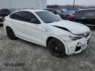 2017 BMW X4 M40i z VIN 5UXXW7C55H0U25737, wystawiony jako Copart lot #46354555 z przebiegiem Nie podano mil oraz Szkoda całkowita • Salvage title. Historia ofert i sprzedaży dostępna na DreamBid. Obrazek 4.
