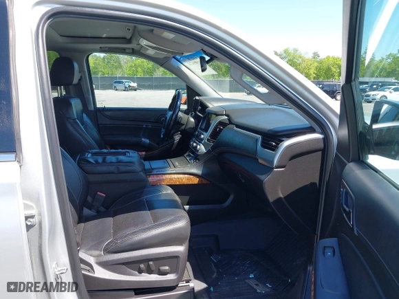 2015 Chevrolet Tahoe LTZ with VIN 1GNSCCKC3FR202934, listed as a IAAI auction lot 41995474 with 258,186 mi miles. Bid and sale history available at carsss.com. Image 5.