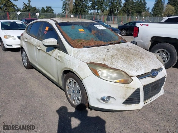2012 Ford Focus SE with VIN 1FAHP3K23CL251716, listed as a IAAI auction lot 42036099 with 119,600 mi miles. Bid and sale history available at carsss.com. Image 1.
