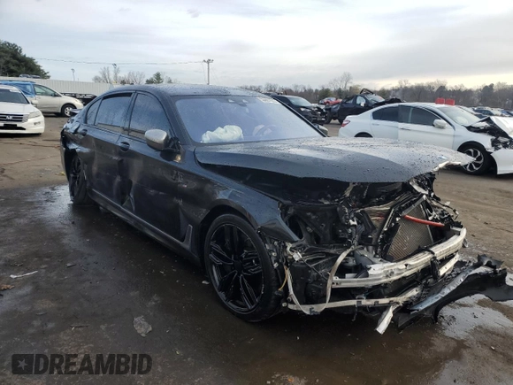 2017 BMW 7 Series with VIN WBA7H6C32HG614368, listed as a Copart auction lot 50607035 with 69,567 mi miles and Salvage title. Bid and sale history available at DreamBid. Image 4.