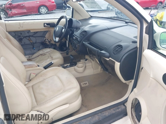 2004 Volkswagen Beetle with VIN 3VWCM21Y64M306721, listed as a IAAI auction lot 41611494 with 183,434 mi miles and . Bid and sale history available at DreamBid. Image 5.