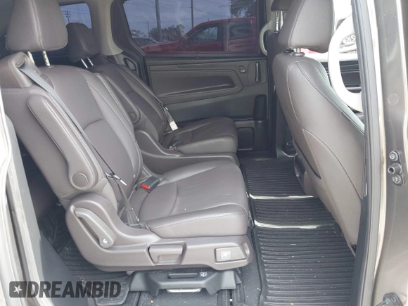 2022 Honda Odyssey EX-L with VIN 5FNRL6H77NB031502, listed as a IAAI auction lot 41706098 with 57,074 mi miles and . Bid and sale history available at DreamBid. Image 8.