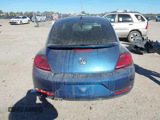 2019 Volkswagen Beetle S with VIN 3VWFD7AT7KM719095, listed as a IAAI auction lot 40919031 with 86,516 mi miles. Bid and sale history available at carsss.com. Image 17.