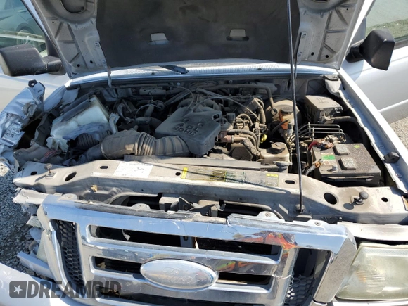 2006 Ford Ranger XLT Appearance с VIN 1FTZR44E16PA71069, выставлен на аукционе Copart как лот 60492435 с пробегом 149 252 миль миль и Списание • Salvage title. История ставок и продаж доступна на DreamBid. Изображение 11.