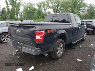 2018 Ford F-150 XL with VIN 1FTEX1EP8JFB61160, listed as a Copart auction lot 59914935 with 97,564 mi miles and Salvage title. Bid and sale history available at DreamBid. Image 3.