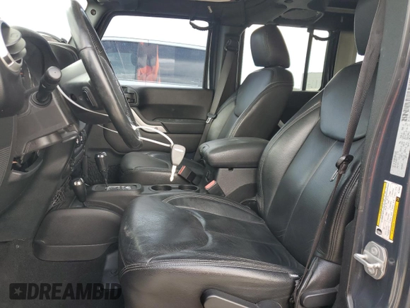 2016 Jeep Wrangler Unlimited Sahara with VIN 1C4HJWEG8GL275844, listed as a Copart auction lot 58997665 with 71,583 mi miles and Salvage title. Bid and sale history available at DreamBid. Image 7.