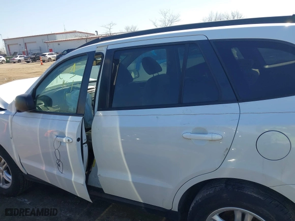 2012 Hyundai Santa Fe GLS with VIN 5XYZG3AB7CG145829, listed as a IAAI auction lot 41768390 with 143,972 mi miles. Bid and sale history available at carsss.com. Image 14.