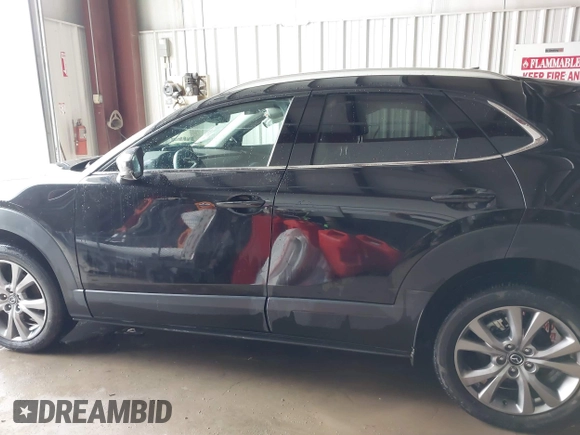 2023 Mazda CX-30 S Premium z VIN 3MVDMBDM5PM589289, wystawiony jako IAAI lot #41331253 z przebiegiem 24 804 mil mil oraz . Historia ofert i sprzedaży dostępna na DreamBid. Obrazek 14.