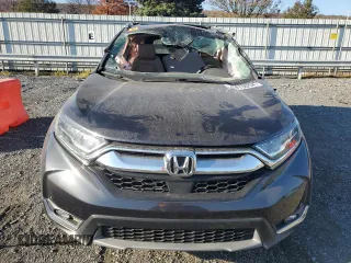 2018 Honda CR-V Touring with VIN 2HKRW2H95JH685749, listed as a Copart auction lot 77413054 with Not Provided miles and Salvage Title. Bid and sale history available at carsss.com. Image 5.