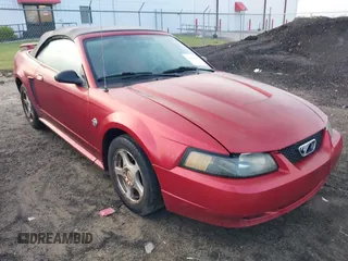 2004 Ford Mustang Deluxe with VIN 1FAFP44604F212319, listed as a IAAI auction lot 42100591 with 191,992 mi miles. Bid and sale history available at carsss.com. Image 1.