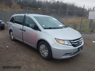 2014 Honda Odyssey LX with VIN 5FNRL5H22EB026657, listed as a IAAI auction lot 41114634 with 132,125 mi miles. Bid and sale history available at carsss.com. Image 1.