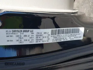 2014 Dodge Grand Caravan SXT with VIN 2C4RDGCG4ER341699, listed as a IAAI auction lot 42064523 with 234,422 mi miles and . Bid and sale history available at DreamBid. Image 9.
