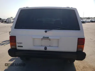 1996 Jeep Cherokee SE with VIN 1J4FT28S3TL197827, listed as a Copart auction lot 75443574 with 116,660 mi miles and Salvage Title. Bid and sale history available at carsss.com. Image 6.