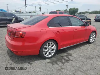 2014 Volkswagen Jetta GLI with VIN 3VW4T7AJ0EM318615, listed as a Copart auction lot 58542385 with 211,879 mi miles and Salvage title. Bid and sale history available at DreamBid. Image 3.