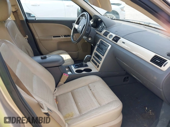 2008 Mercury Sable Premier z VIN 1MEHM42W18G604352, wystawiony jako IAAI lot #42172425 z przebiegiem 136 727 mil mil oraz . Historia ofert i sprzedaży dostępna na DreamBid. Obrazek 5.