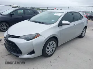 2018 Toyota Corolla L z VIN 5YFBURHE7JP822870, wystawiony jako IAAI lot #42318344 z przebiegiem 118 519 mil mil oraz . Historia ofert i sprzedaży dostępna na DreamBid. Obrazek 18.