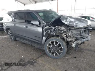2021 Chevrolet Suburban RST z VIN 1GNSCEKD0MR253468, wystawiony jako IAAI lot #41459452 z przebiegiem 36 005 mil mil oraz . Historia ofert i sprzedaży dostępna na DreamBid. Obrazek 1.