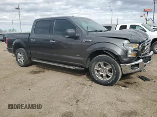 2015 Ford F-150 XLT with VIN 1FTEW1EP4FKD65763, listed as a Copart auction lot 50697575 with 122,124 mi miles and Clean Title. Bid and sale history available at DreamBid. Image 4.