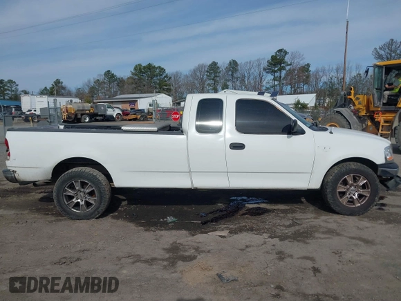 2000 Ford F-150 XL with VIN 1FTRX17LXYNC39983, listed as a IAAI auction lot 41750277 with 170,016 mi miles. Bid and sale history available at carsss.com. Image 13.