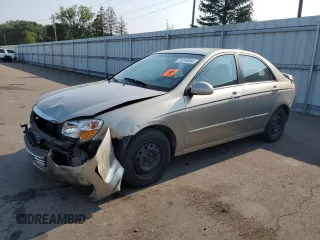 2008 Kia Spectra EX with VIN KNAFE121085524056, listed as a Copart auction lot 71218854 with 128,944 mi miles and Salvage Title. Bid and sale history available at carsss.com. Image 1.
