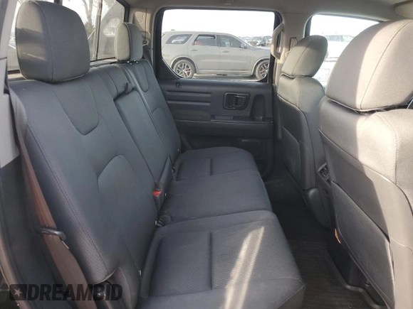 2013 Honda Ridgeline Sport z VIN 5FPYK1F76DB001269, wystawiony jako Copart lot #47487675 z przebiegiem 159 657 mil mil oraz Szkoda całkowita • Salvage title. Historia ofert i sprzedaży dostępna na DreamBid. Obrazek 10.